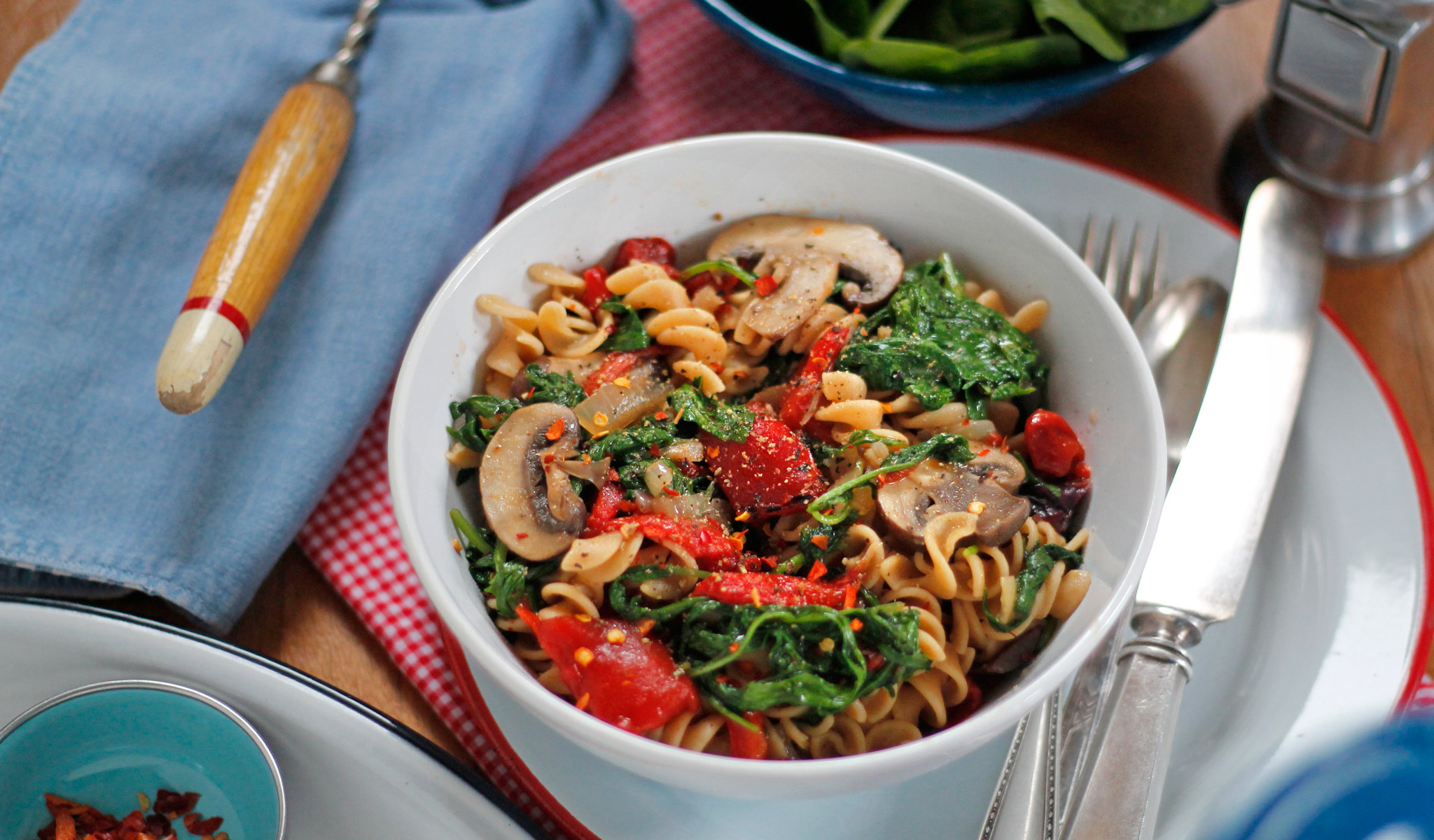 Kale Italia with Roasted Red Peppers and Mushrooms over Pasta