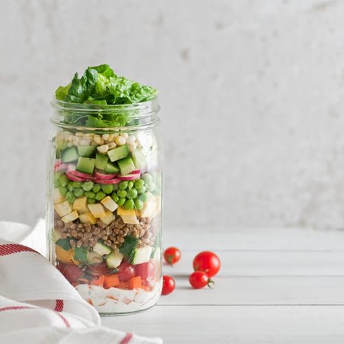 chopped garden salad in a jar