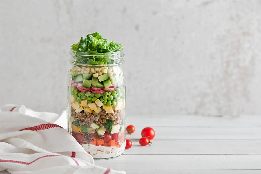 chopped garden salad in a jar